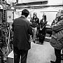 Professor William Wang guides the tour group through the labs