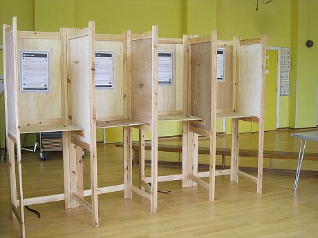 A photo showing a row of polling booths