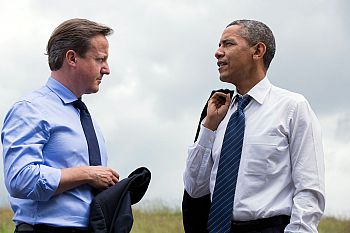 A photo of David Cameron and Barack Obama talking