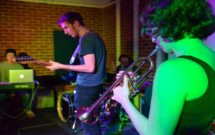 Students performing in the Recital Room