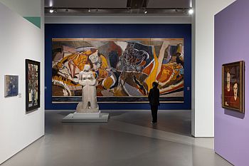 View of a gallery displaying artworks