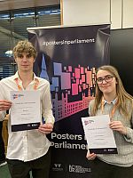 Charlotte Richardson and Elliot Jones receiving their certificates for attending Pip 2025