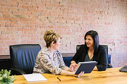 two colleagues in a meeting