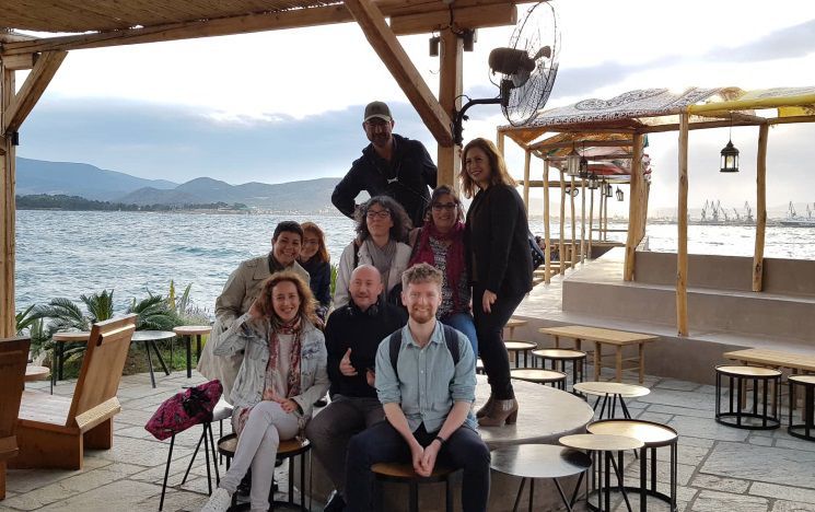 Icon - staff from around Europe posing for a photo in front of beach setting