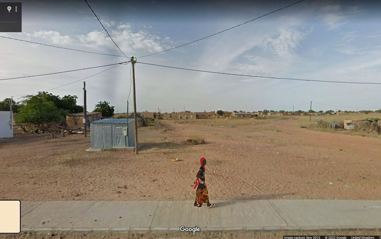 Screenshot of Google maps in street view with overlaid graphic of a person
