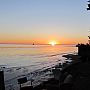 Coastal sunset on a sandy beach