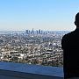 Student looking out over city skyline