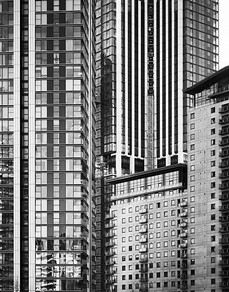 A modern high-rise in London photographed in black and white.