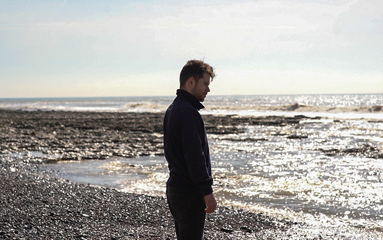A man standing on a beach