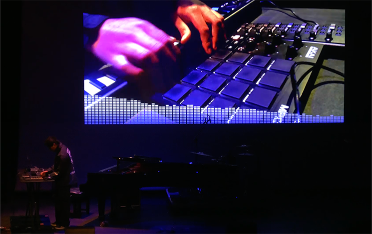 Hands touching blue keys