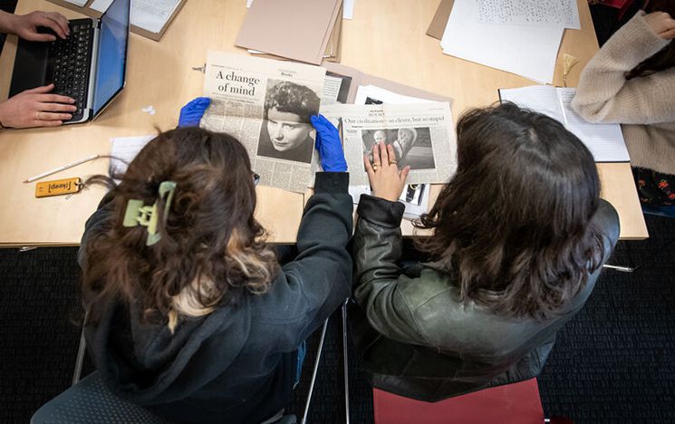 Students looking at artefacts at The Keep