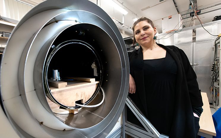 Phd student Aikaterini Gialopsou with magnetic shield