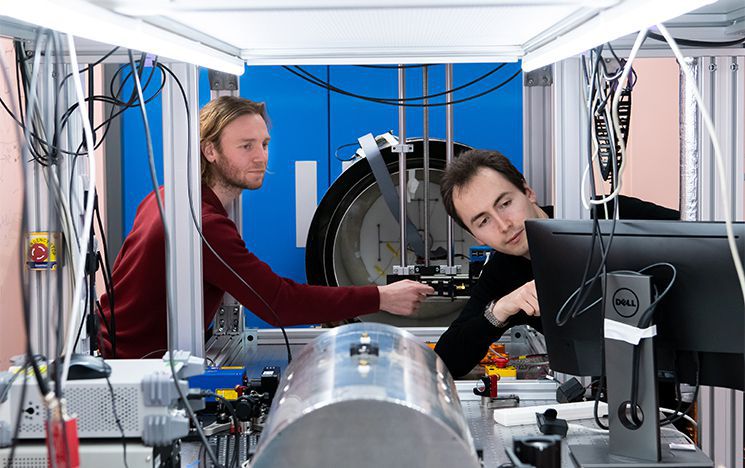 Researchers scanning electrical vehicle battery