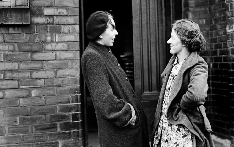 Two women talking in the street