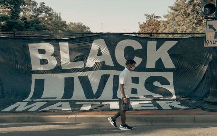 Black Lives Matter banner - Photo by Clay Banks on Unsplash