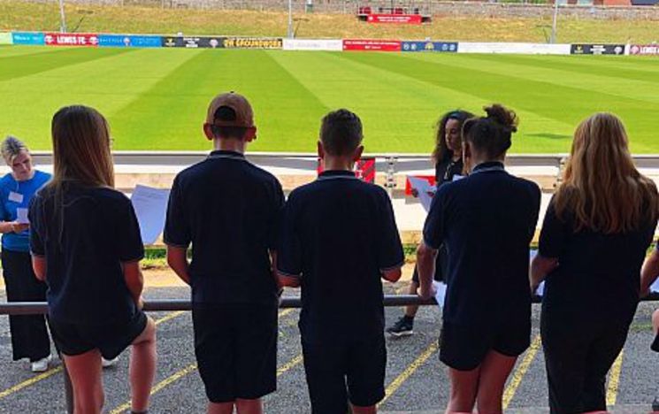 Audience in Fulton lecture theatre listening to speakers