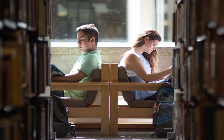 Students reading in library