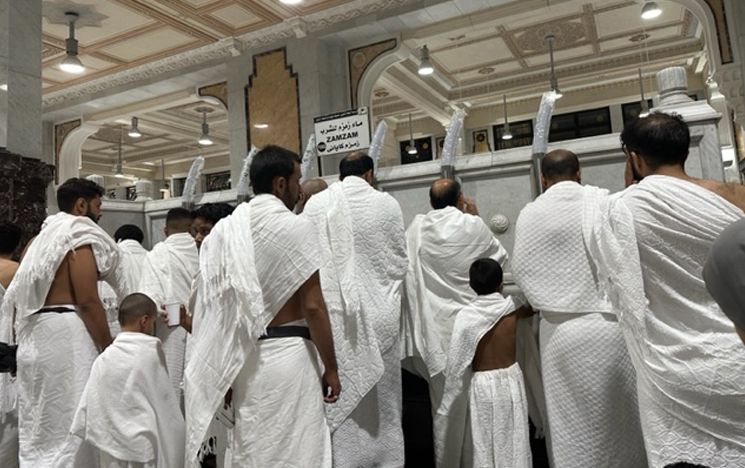 Blessing 3 with Zamzam water after the rituals