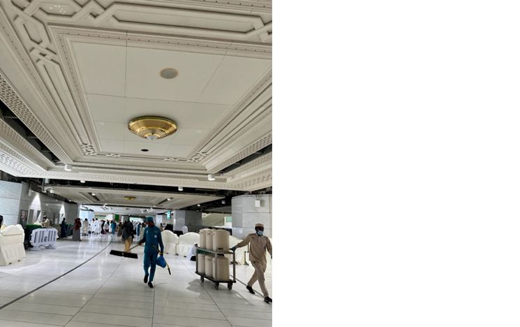 Distributing Zamzam water in different locations in the Mosque
