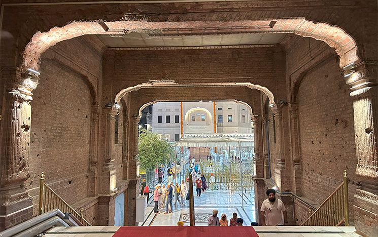 Bullet holes on the side of the entrance to the Harmandir Sahib from the (para)military storming of the Harmandir Sahib in Operation Bluestar, 1984