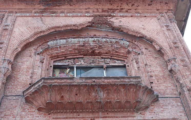 Damaged areas of the Harmandir Sahib complex as a record of the Operation Bluestar (para)military attack in 1984