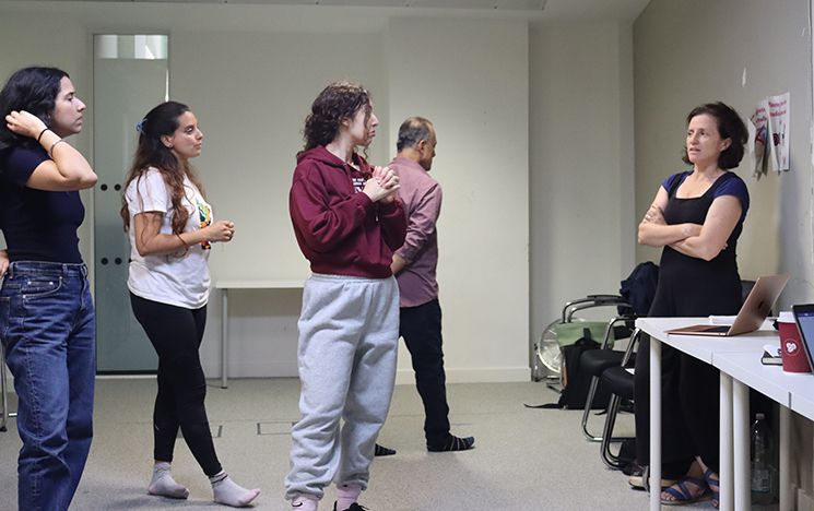 The four theatre actors engaging with the director in the workshop on the violence surrounding the storming of the Harmandir Sahib
