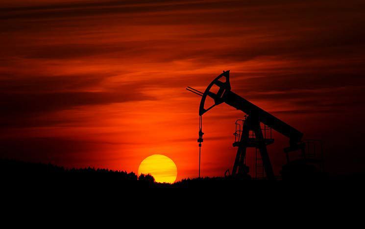 oil rig under a sunset
