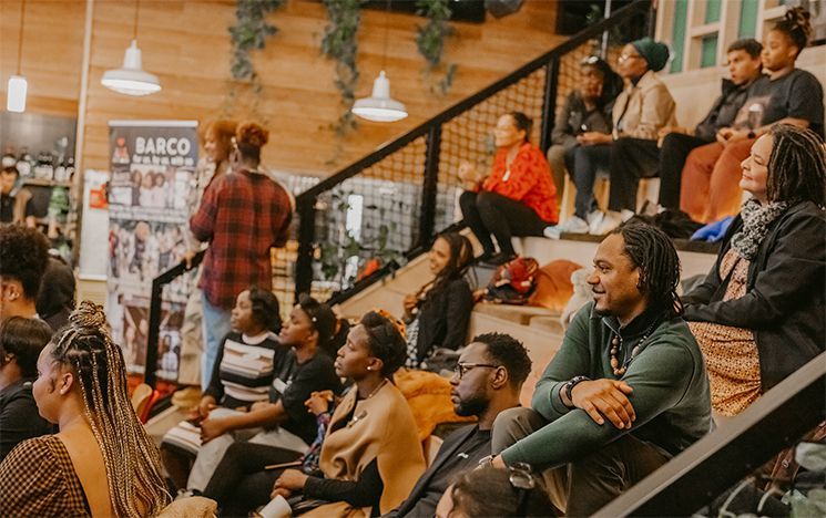 People sitting on tiered seating