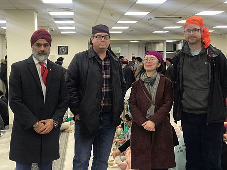The researchers pose for a photo at the Southall Centre, London