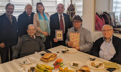 Prof. Magnus Marsden poses for a photo with members of the Bukharian Jewish community