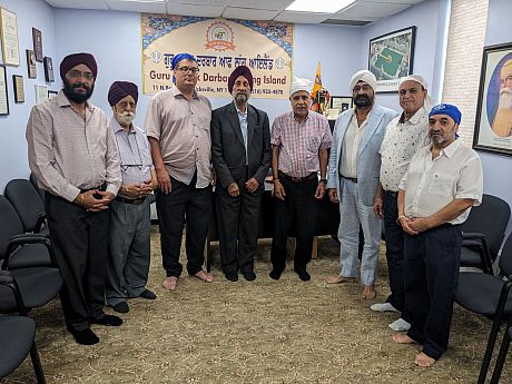 Prof. Magnus Marsden stood with the Committee of the Guru Nanak Darbar Gurdwara (Afghan Sikhs, Long Island)