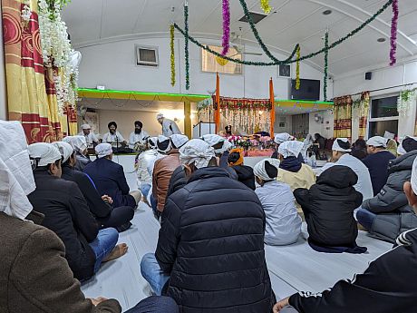 Attendees of the birthday celebrations at the Guru Nanak Society of London Trust Gurdwara in Tooting