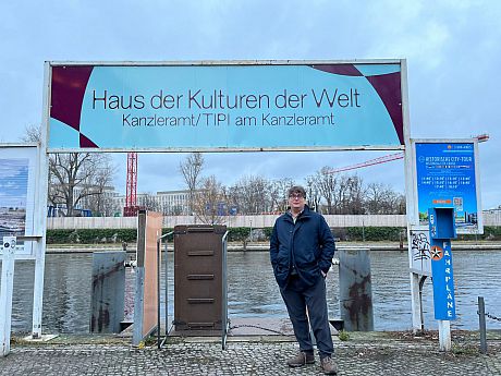 Magnus stood under the Haus der Kulturen Der Welt sign