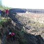 Permafrost Laboratory researchers inspect the Batagay megaslump in Northeast Siberia, the biggest permafrost crater in the world