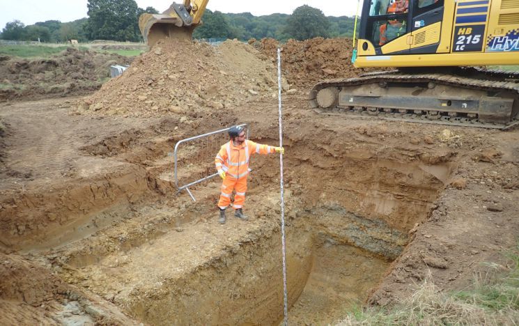 A Permafrost Laboratory researcher carries out consultancy work in a trial pit in London