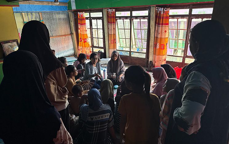Group of women sitting and standing