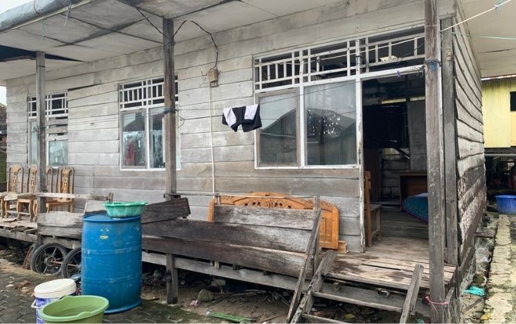The outside of a wooden building used as a healthcare facility
