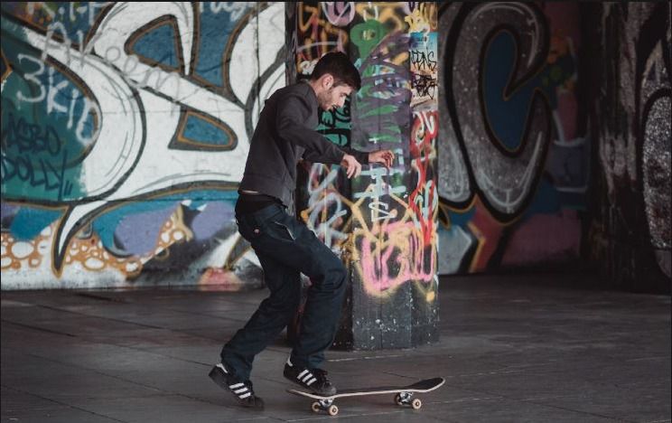 A person skateboarding at the Undercroft at the Southbank