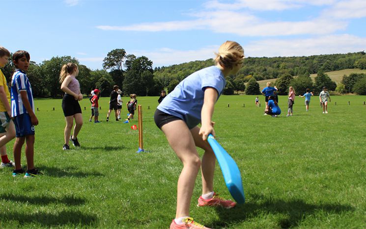 Children playing rounders