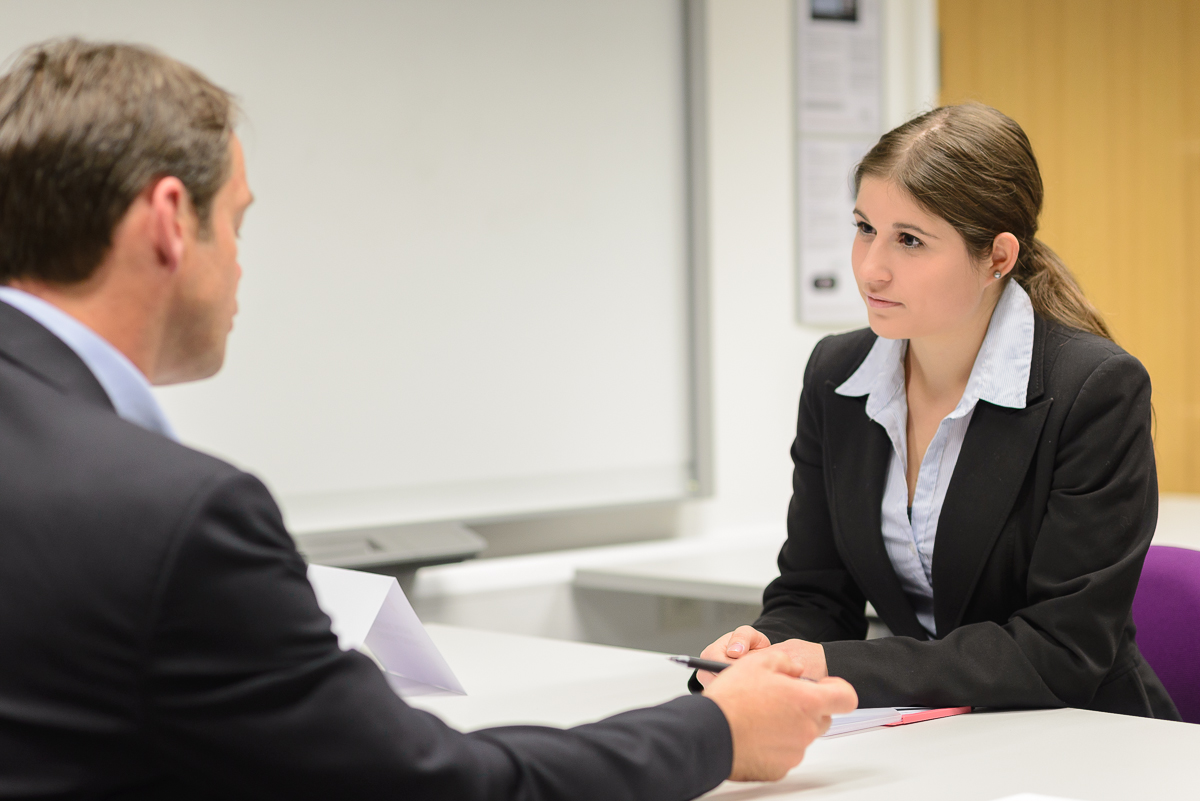 a student speaking to a lecturer