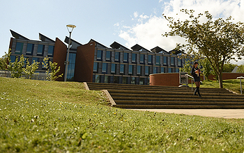 Grass in the foreground with the Jubilee building in the background