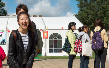 Potential students look around the University of Sussex campus