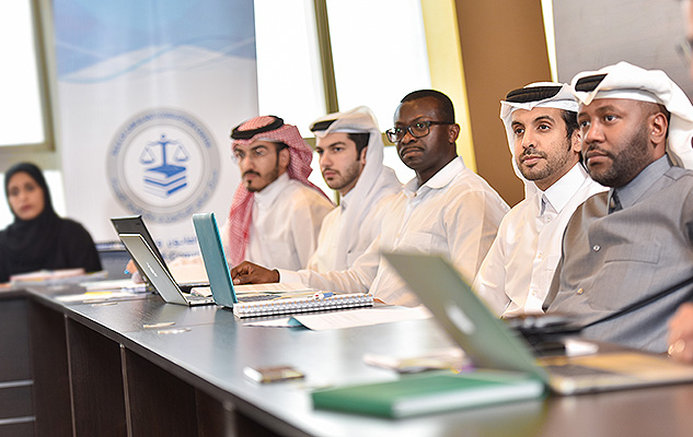 A group of Qatari students studying a University of Sussex course