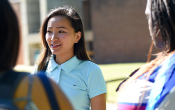 Students in conversation on campus