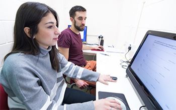 Researchers in a computer lab