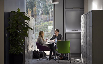 Students studying in a study space at the University of Sussex