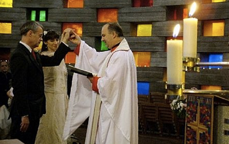 Alexandra and Jeremy getting married in the meeting house