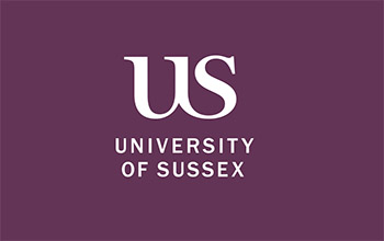 The University of Sussex logo behind the reception desk in Sussex House