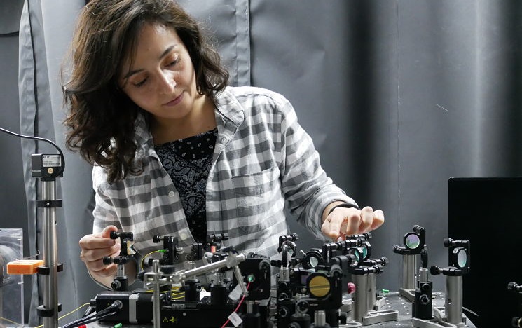 A researcher with some lab equipment