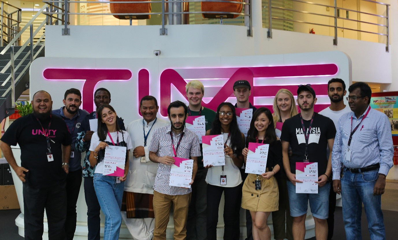 The students with their certificates at the end of their internship at TIME